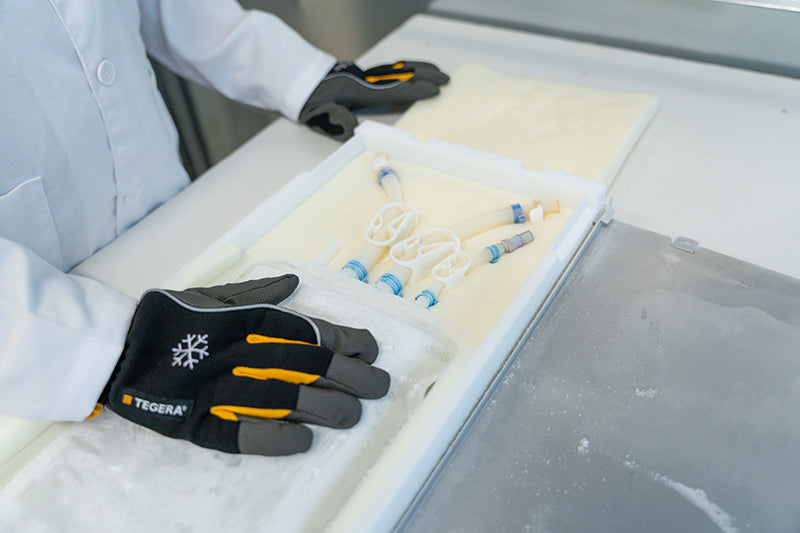 A frozen single-use bioprocess container protected by a RoSS Shell.