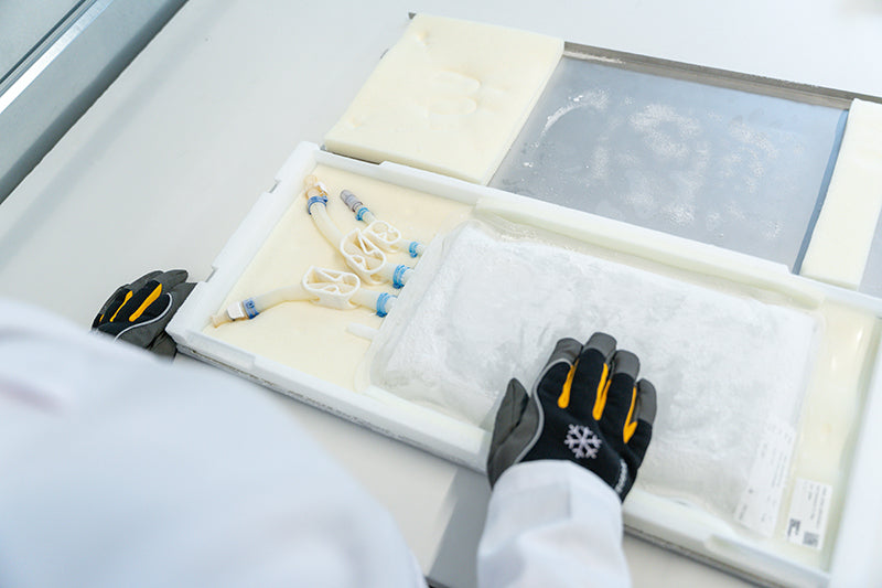 A top-view image of a frozen single-use bioprocess container protected by a RoSS Shell.