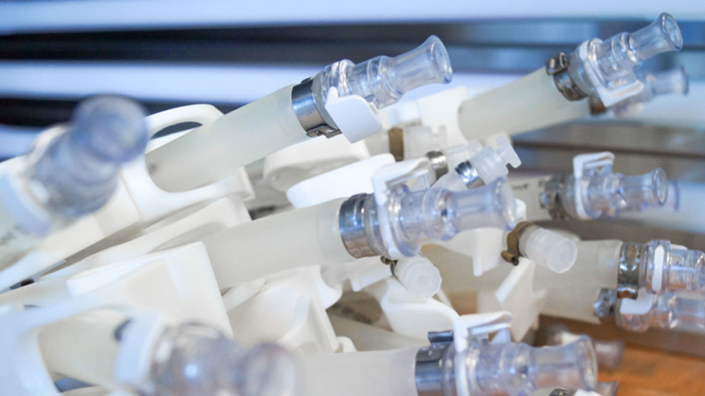 Aseptic single use bag filling with single use support tubing system Aseptic single use bag filling with single use support tubing system